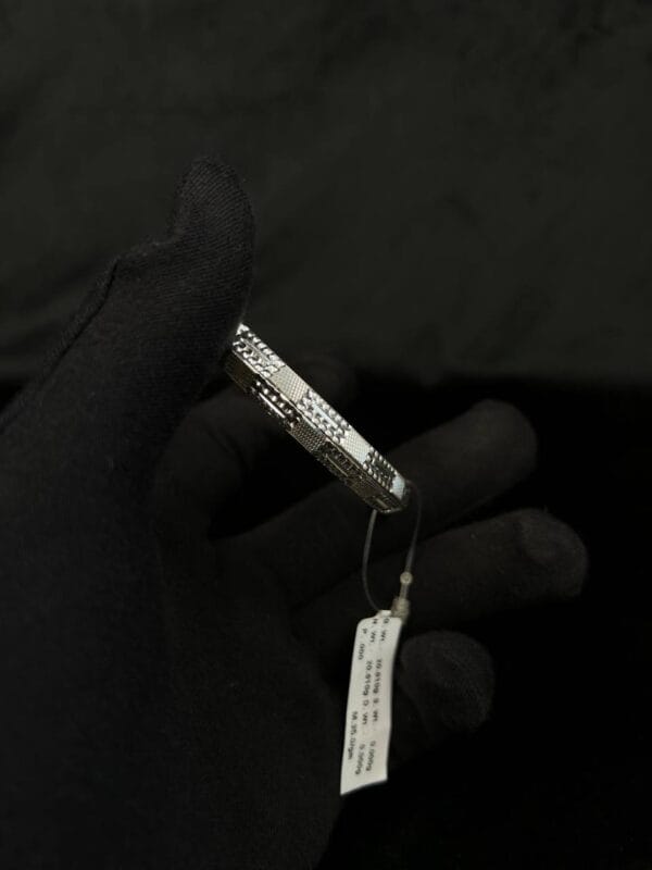 Silver Valor: Engraved Majesty Bangle